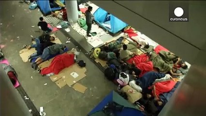 Relieved migrants cross Hungary-Austria border