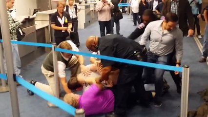 Drunk Idiot Starts a Fight at DFW Airport