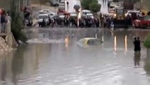 Rescued a taxi drowning in rainwater by tractor