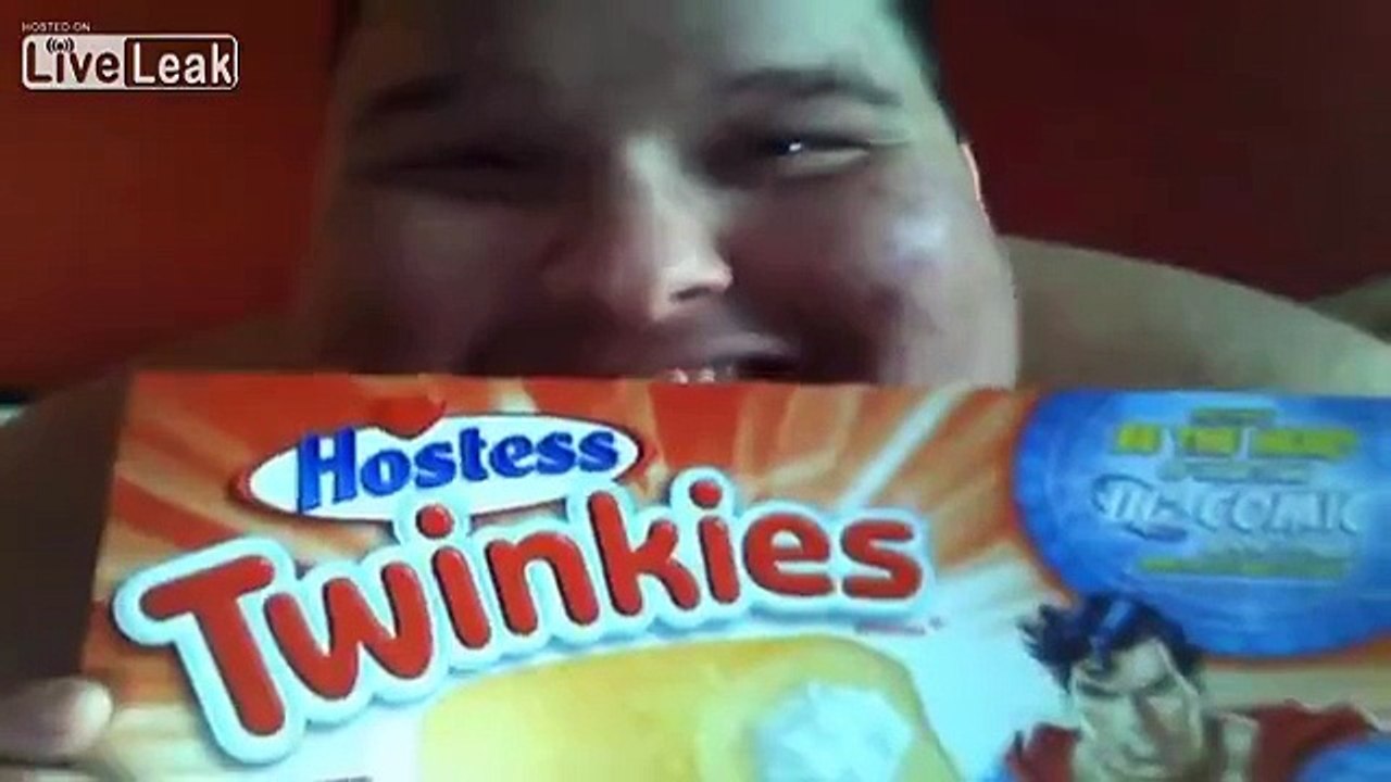 Fat guy eating Twinkies
