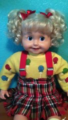 How to  safely restyle or fix the curls in the hair of a talking Cricket doll.