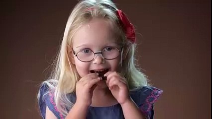 Kids try dark chocolate for the first time.