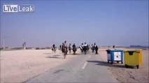 Tourists riding horses at Kish Island, Iran