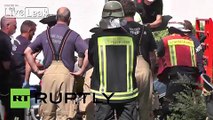 Germany: Watch 300kg woman be lifted by crane from Berlin apartment