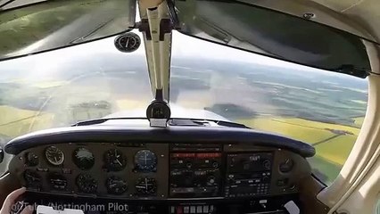 Watch pilot's extremely close encounter with a microlight