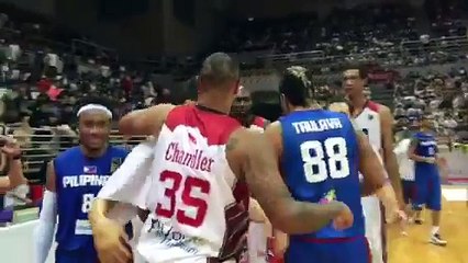 Marc Pingris bonds with ex-teammate Marquin Chandler before Gilas' victory huddle