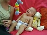 3 month old baby hysterically laughing at funny worm