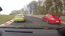 Renault Megane RS racing with a Porsche Cayman R in NÃ¼rburgring