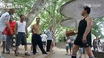 70 yo Kung Fu man can hit crotch with brick and iron weight
