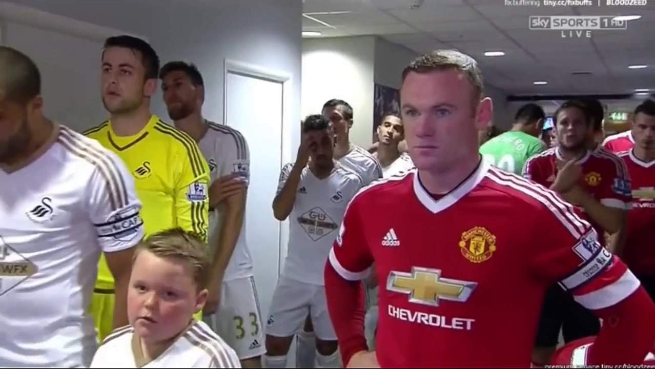 La tête du gamin fan de Rooney !