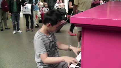 Rather talented lad on public piano at St Pancras International Station, London