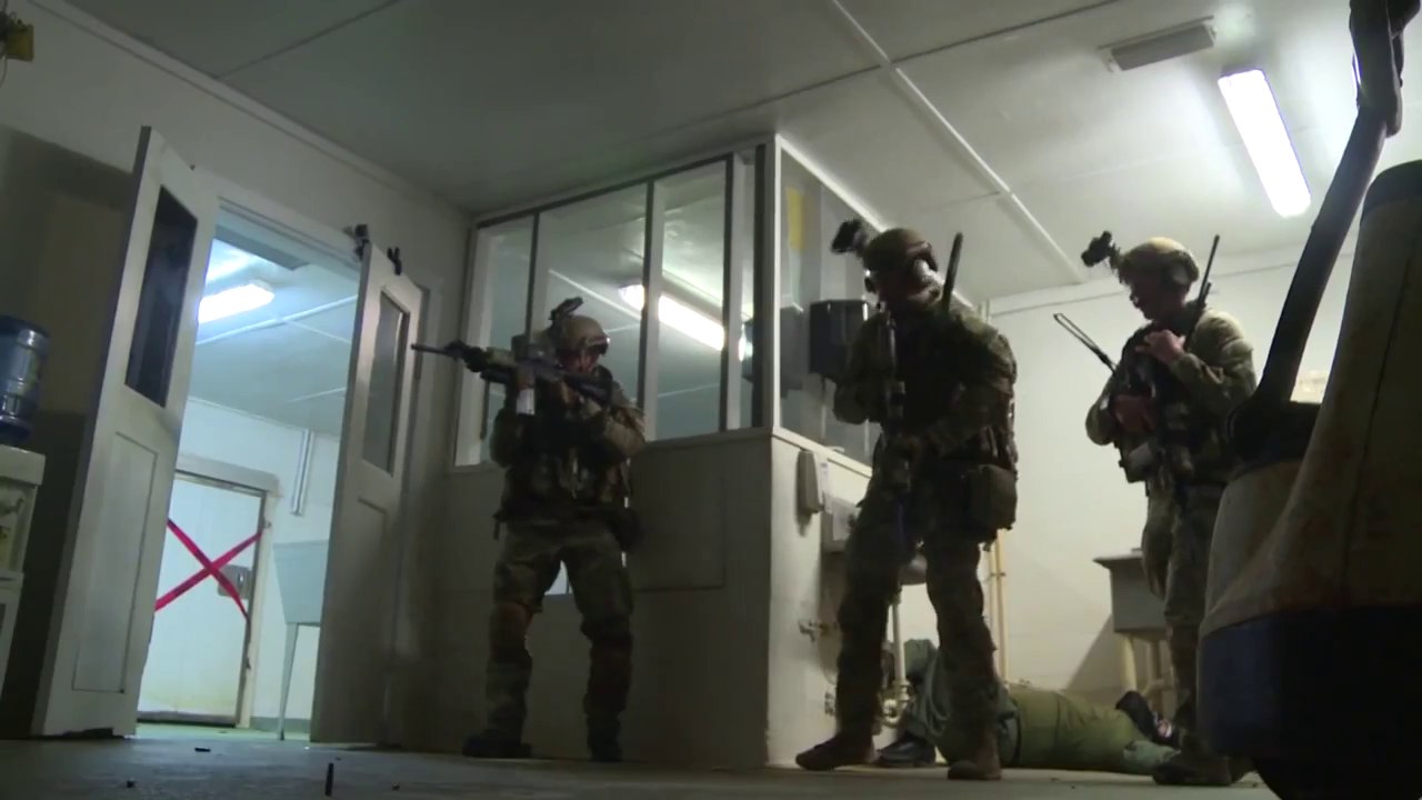 US Special Force in Action During Heavy Close Quarters Combat