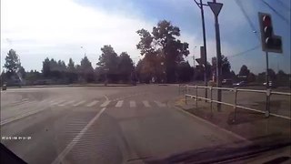 Motorcyclist Lands on Top of Car After Violent Crash