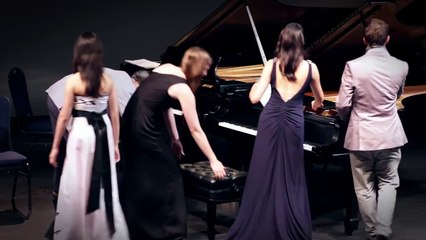 One piano, eight hands