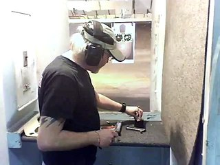 Colt Stainless 1911 model Gold Cup, 80 series 45ACP - firing at the range.