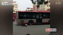 Man throws his head under bus wheel to scam driver