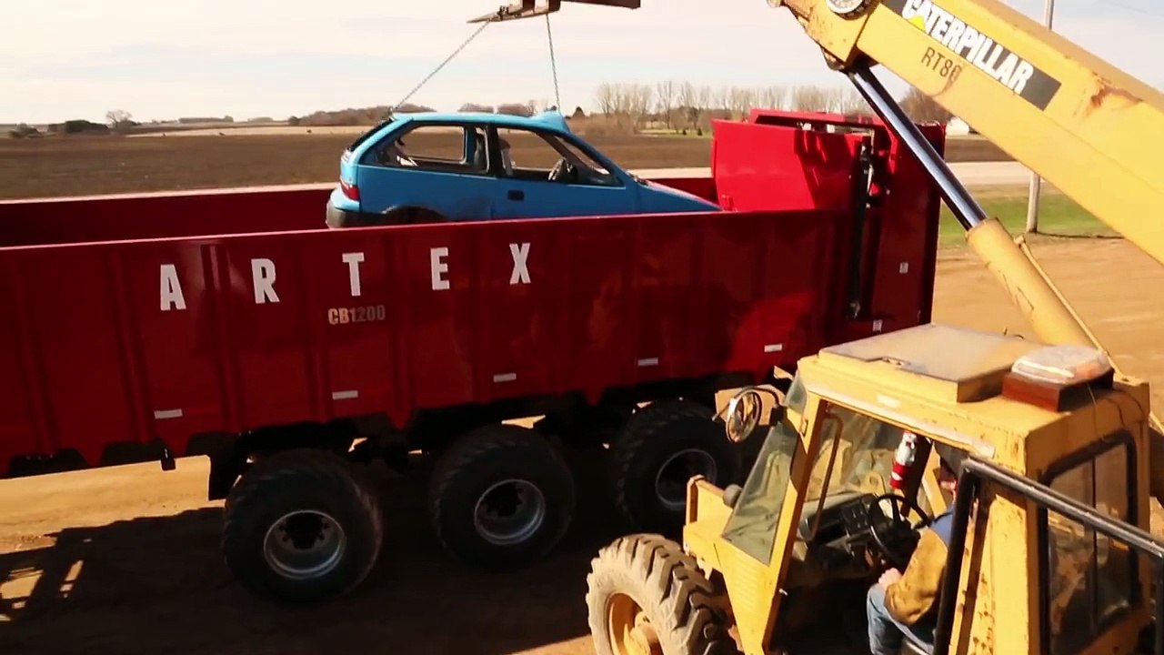 Watch a Manure Spreader Shred a Car