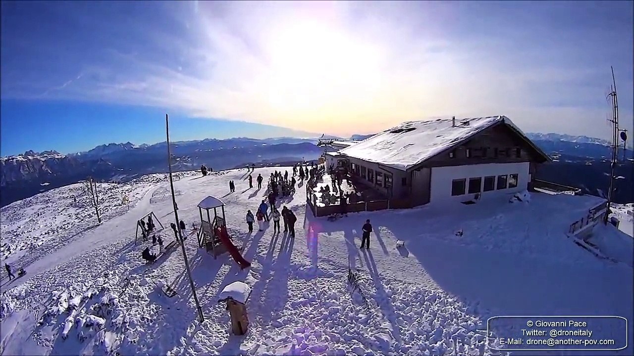 Drone cam over the mountain top of ski resort