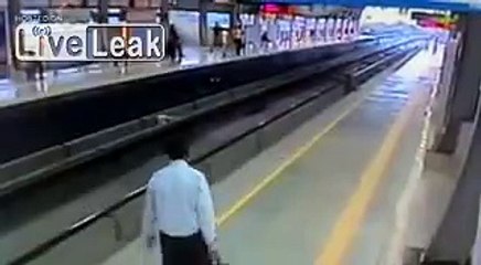 India - Drunk man gets crushed by metro train - GRUESOME!!!!