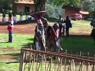 Cérémonie de sortie du Roi de la Case Sacrée Bamiléké ( Sortie du Laà Kam à Bandjoun )