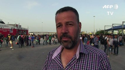 2,000 migrants arrive in Athens from Lesbos island