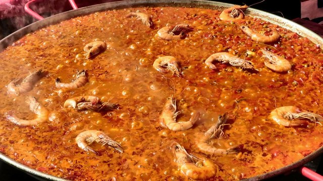 London Street Food. Preparing a Fresh Spanish Paella with Seafood. Seen in Brick Lane