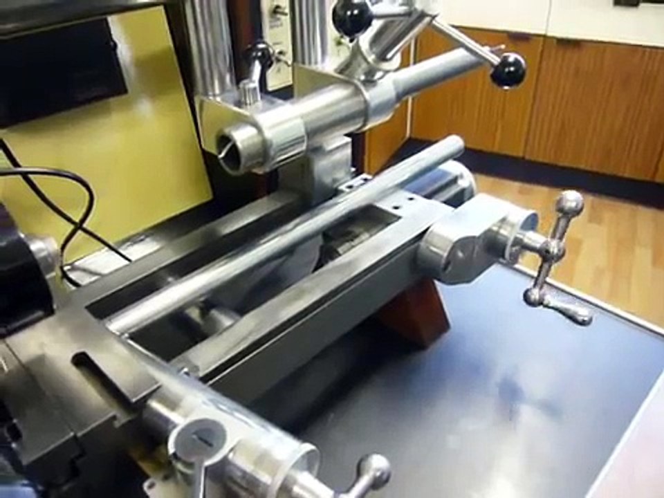 Stepperhead sharpening end mill flutes