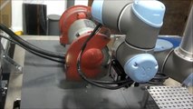Universal Robot buffing Application using Animatics Smart motor.