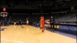 Nash kicks the ball into the hoop