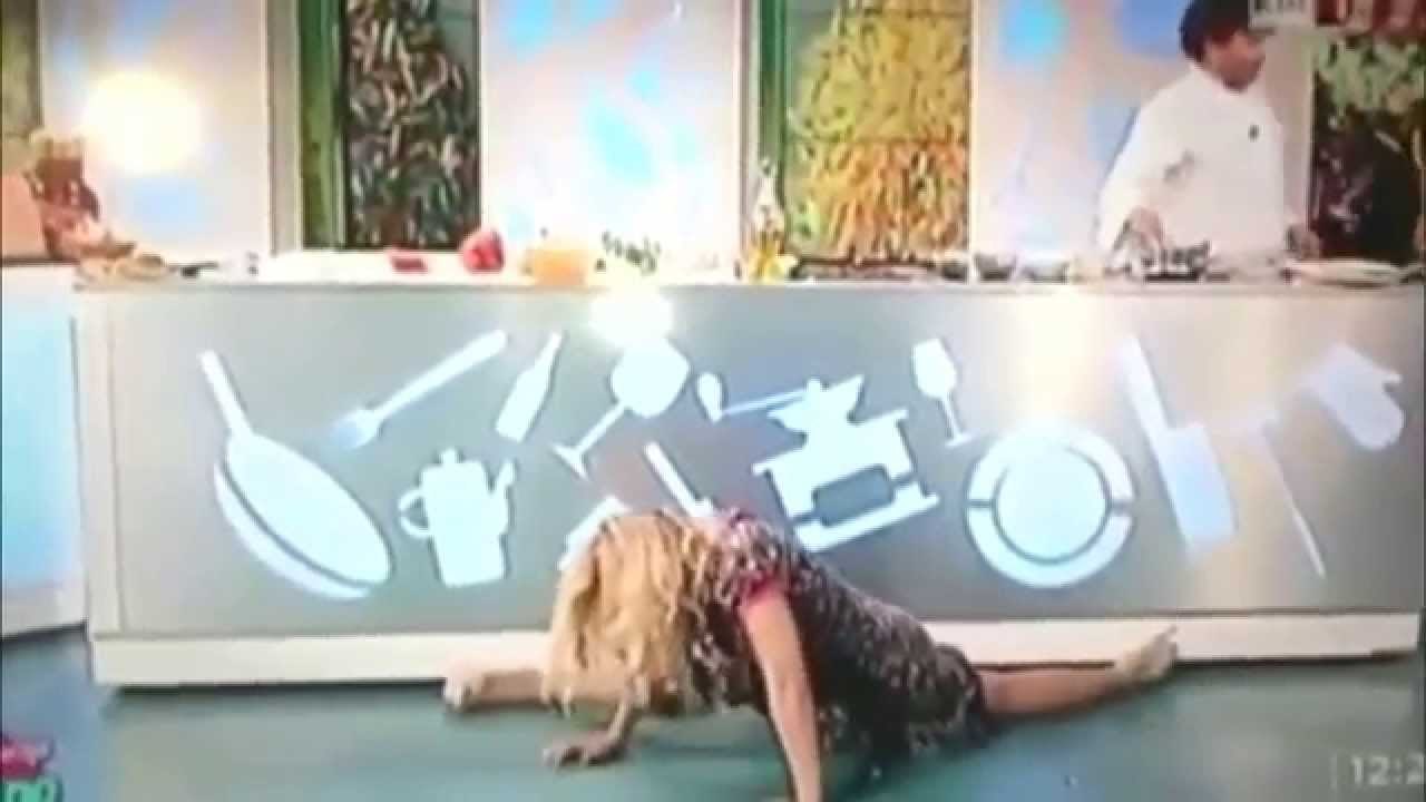 Lisa Fusco attempts to show off her impressive gymnastic skills  fails to do the splits