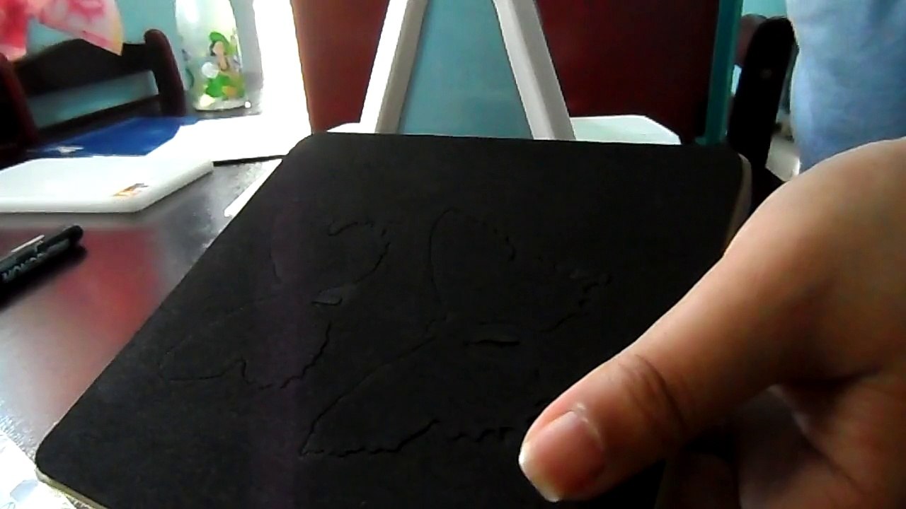 Cutting and embossing butterflies using Cuttlebug machine and Sizzix big plate