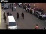 Rioter takes a beating rom the police