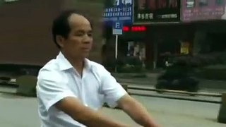 Chinese farmer's suitcase scooter in action
