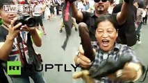Thailand: Protester raises her dildos to the army