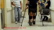 Paralyzed man voluntarily moves his legs in exoskeleton