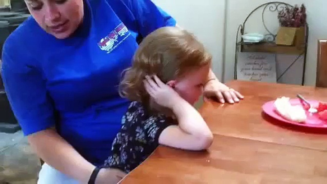 Baby pukes on mom