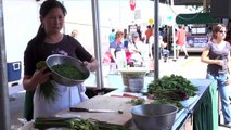 Chef Tammy Wong cooks chive dumplings at the Minneapolis Farmers Market