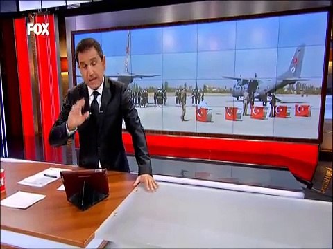 Başbakan Davutoğlu Van'da Dağlıca şehitlerinin töreninde gözyaşlarını tutamadı