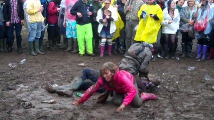 Girls falling about in mud at T in the Park 2010