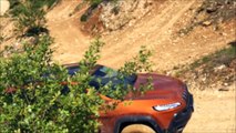 Jeep Cherokee Trailhawk KL with A/T tires in the off road area of Langenaltheim