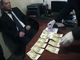 Un avocat a cerut 3000 de euro mită pentru a influenţa procurorii şi poliţiştii