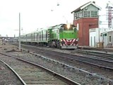 Tren 266 de Ferrocentral con Loc. GM GT-22 9021 saliendo de Patio Parada.-