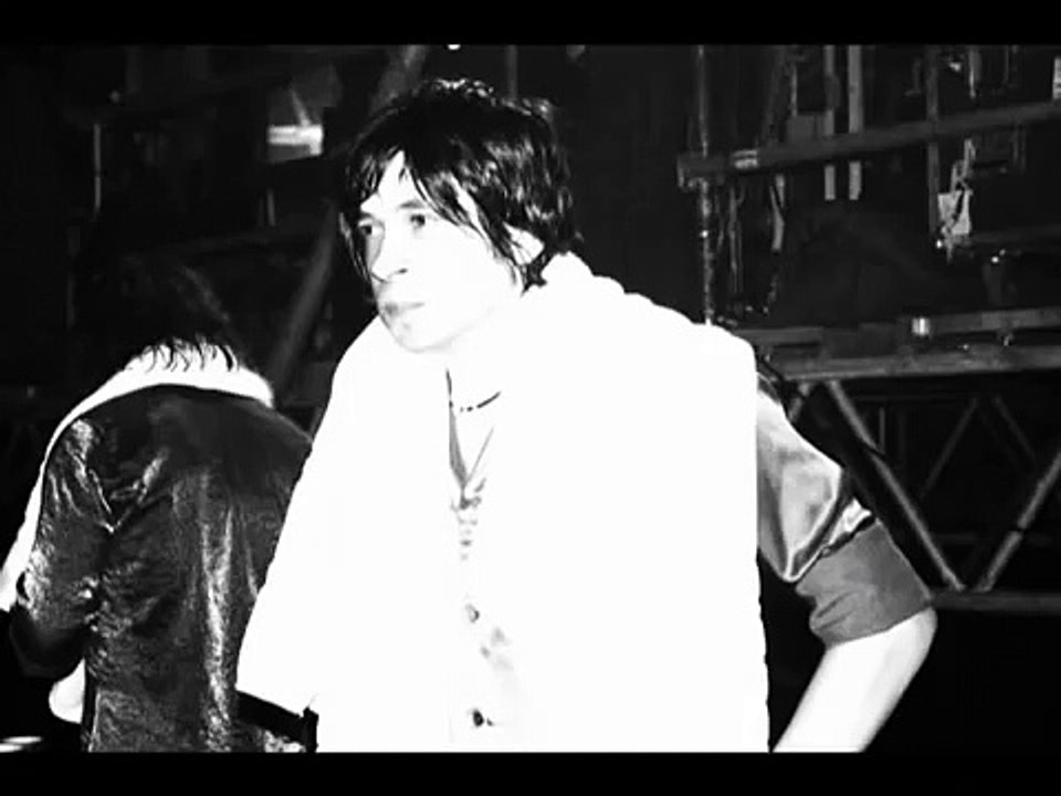 Enrique Bunbury -  Una Canción Triste (Fotovideo)