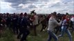Hungarian Camerawoman Fired for Tripping Refugees Trying to Escape Police