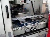 CNC machining holes into aluminium extrusion