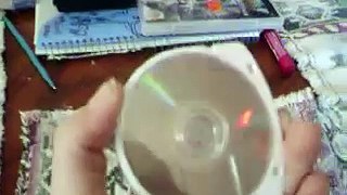 HOW  TO  INSERT  A  UMD  DISK  INTO A  PSP  FOR  DUMASS'S
