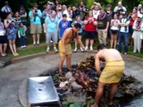 Digging up Kalua Pig