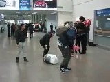 les twins dancing at airport