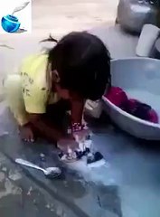 Baby washing the cloths