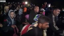 Refugees break through Hungarian police line at border